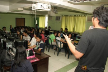 Ryan Ermita teaching the students on how create a simple webpage using HTML.